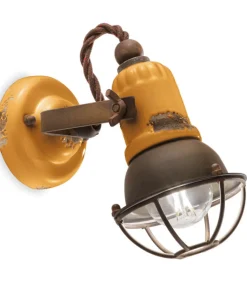 Houston, Applique Di Ferroluce In Ceramica Finitura Anticata Vintage Con Dettagli In Metallo Corten.