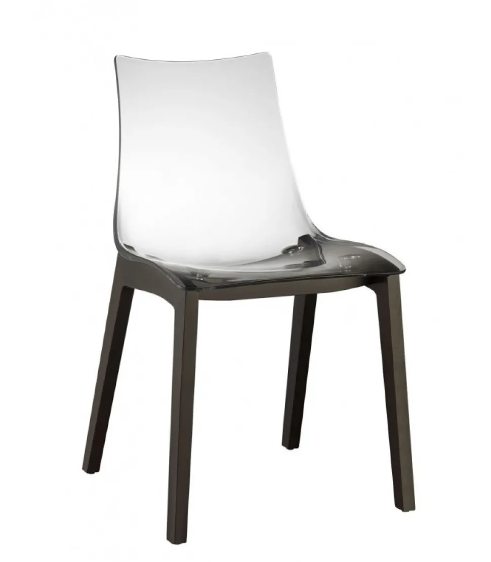 La Scocca In Policarbonato E Disponibile Bianca E Trasparente, Le Gambe In Faggio Naturale E Wenge.