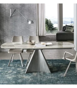 Tornado, Tavolo Con Piano Girevole Ed Allunghe Laterali In Gres Porcellanato.